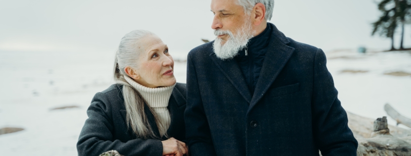 happy older couple in winter