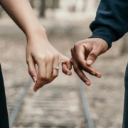 Successful couple holding hands